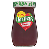 A jar of Hartleys - Strawberry Seedless - 300g jam on a white background.